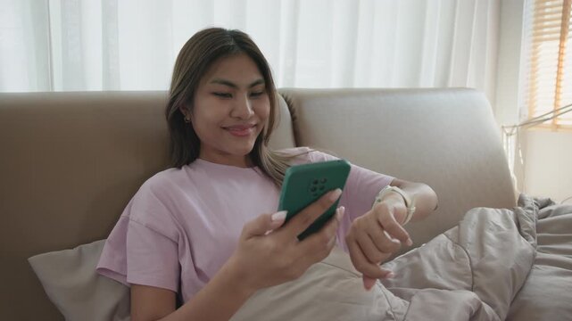 AI smart IOT watch wrist wear collect ECG heart rate data sleep track record health care device digital internet of things app. Asia people woman urban tech life home future living wake get up morning