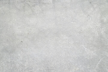 Textured grey concrete surface in frame, ideal for backgrounds in architecture, construction, urban design, and industrial projects. © Dinamartina93