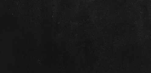 Black surface with faint variations in texture. Suitable for background designs, product photography, and minimalist concepts needing a sleek base.