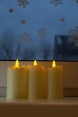 Christmas candles on the window
