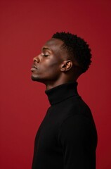 Obraz premium Portrait of Young African American Man in Contemplation Against Red Background