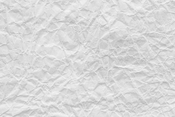 Naklejka premium White crumpled paper texture as background