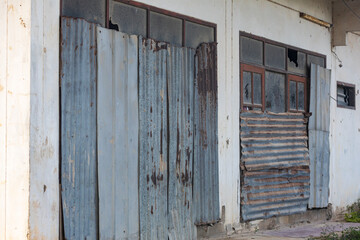 A building with a lot of rusted metal on it