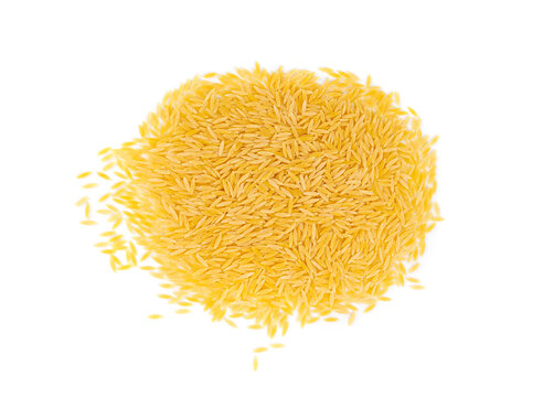 Raw orzo pasta, risoni or kritharaki pile