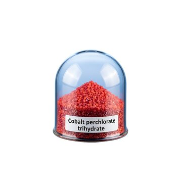 A laboratory glass container filled with red cobalt perchlorate trihydrate crystals, viewed from the side, against a neutral background.