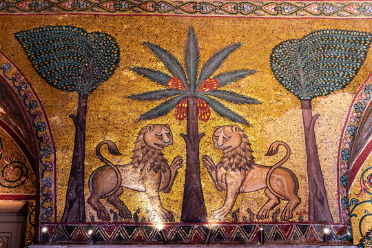 Two golden lions in front of a palm tree: A detail of the world-famous mosaics in the Sala di Re Ruggero in the Norman Palace in Palermo