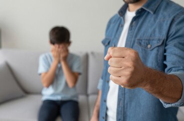 Obraz premium Aggressive Father Threatening Son: Domestic Abuse, Violence, and Family Conflict in the Home Environment