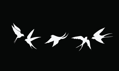 Obraz premium Flying Swallows Silhouette Set White on Black Vector