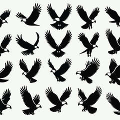 Fototapeta premium A collection of black silhouettes depicting eagles in various flight poses and angles
