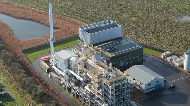 Cinematic Drone Shot of Boston Energy Production Facility at Riverside Industrial Estate, Sustainable Biomass Power Generation in England. 