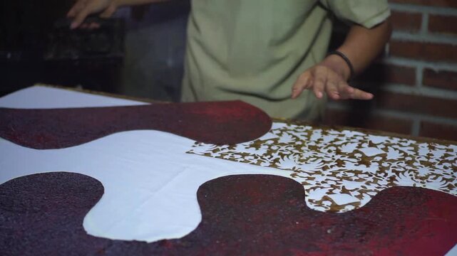 Handcrafted Batik Pattern Stamping on Textile Cloth