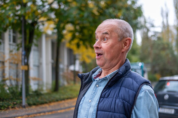 Fototapeta premium open-mouthed senior man in shock, capturing raw emotion surprise and disbelief unexpected news, Mature woman Emotional portrait