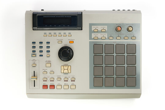 Old and classic AKAI MPC 2000XL sampler isolated on white background