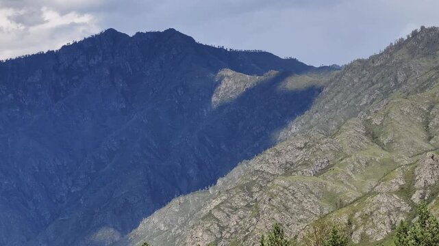 Video of spurs of the Kuminsky mountain range in Altai. Natural highlands landscape background.