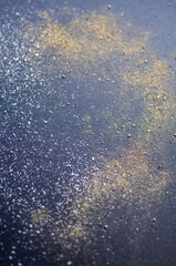 Fototapeta premium Scattered black pepper and salt on a dark background