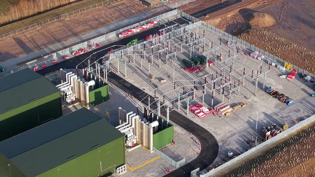 Detailed drone view of specialized grid stability facility at Walpole substation near Wisbech featuring synchronous compensators for the UK grid.