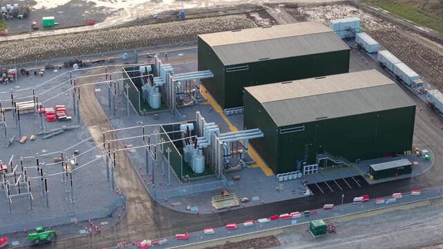 Critical infrastructure drone view of Walpole synchronous condenser plant near Wisbech England enhancing national grid security for renewable power.