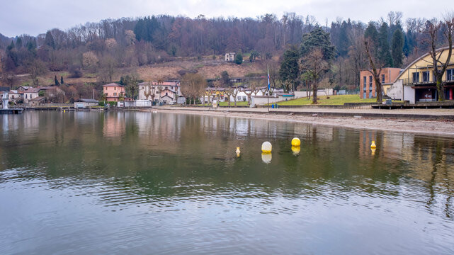 Beach resort along the shoreline of Orta Lake, during wintertime. Is a glacial origin lake in northern Italy, Piedmont region, with San Giulio island, home of nuns cloister and UNESCO Site.