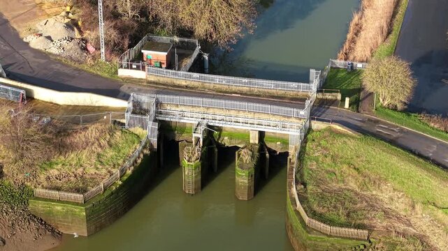 Aerial drone shot of the Boston Barrier flood defence system and rising sector gate on the Haven river in Lincolnshire UK