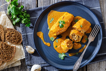 Stuffed cabbage rolls with quinoa and tomato sauce