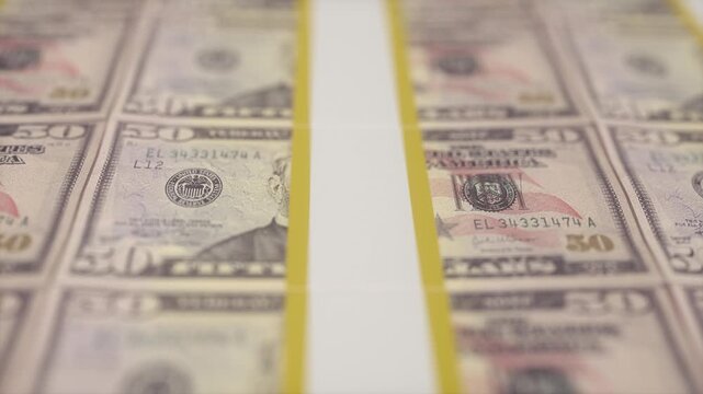 High-Resolution Close-Up of Fifty Dollar Bills in Printing Process