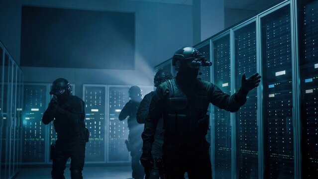 Tactical swat team with man on patrol in dark server room. Special forces raid on data center. IT security enforcement, digital protection