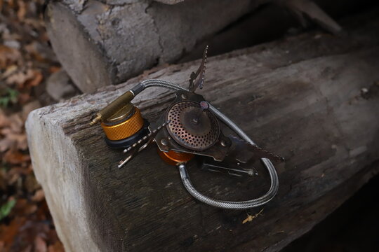 old gas burner on the nature log in the forest