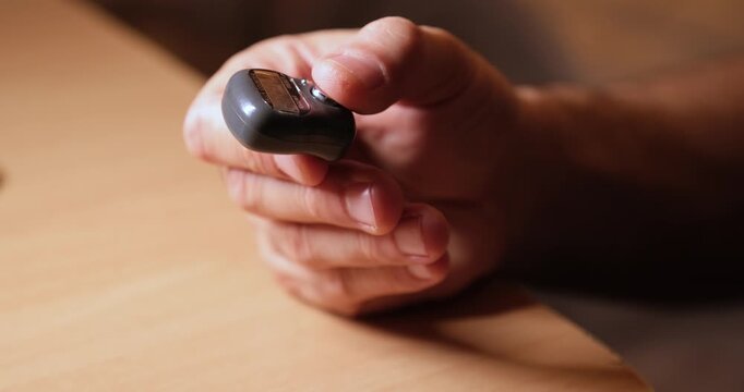 Hand Using Digital Prayer Counter, Close-Up of Islamic Worship Device
