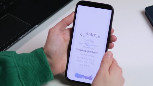 Close-up of hands entering a tech giveaway on a mobile app. Sleek UI showing prize details, loading, and Entry Confirmed screen. Ideal for social media marketing, mobile gaming, and digital contest