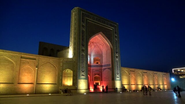The ancient Kalyan Madrasah in the night landscape. Bukhara, Uzbekistan