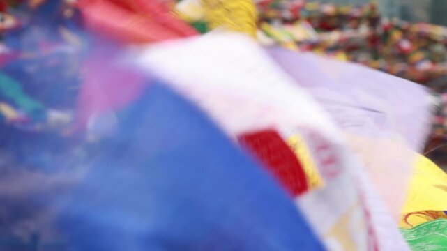 Colorful Buddhist prayer flags waving in the wind at Buddha Mandir Dalai Hill Dehradun symbolizing peace spirituality Tibetan culture faith and Himalayan tradition