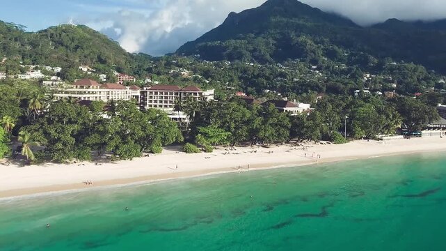 Coastline drone view over the island of Mahe', bird eye view panoramic tropical island with crystal clear water, Seychelles
