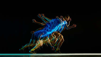 Obraz premium Stroboscopic sprint phase with layered runner silhouettes on black background. Concept of peak acceleration, forward momentum, muscular coordination, and high intensity athletic performance.