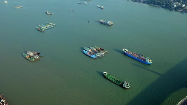 Bustling maritime trade and shipping activity at the Port of Chittagong from a high-angle drone perspective