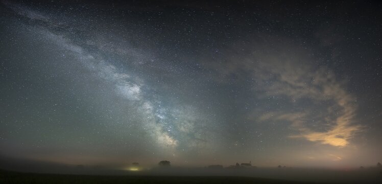 Church of St. Alban with village of G&ouml;rwangs and Milky Way with starry sky, Oberg&uuml;nzburg, Ostallg&auml;u, Bavaria, Germany