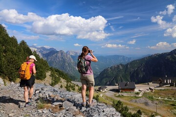Hiking adventure in Albania. Summer landscape of Theth Mountains in Albanian Alps (also known as Accursed Mountains). Alps of Albania National Park. Mark Zagore mountain peak area.