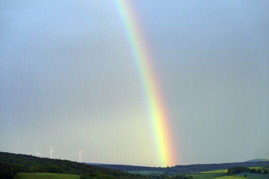 Rainbow and wind turbines, Hesse, Germany