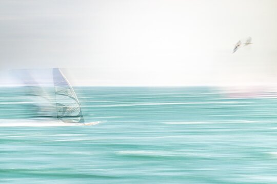 Surfer as a pull-along, artistically worked, Garda, Lake Garda, Trento, Italy