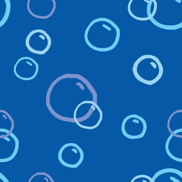 seamless pattern of handdrawn soap bubbles on blue background vector design