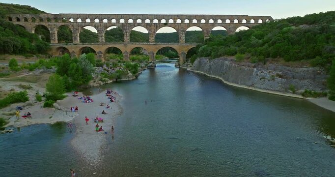 Aerial view of Pont du Gard, ancient Roman aqueduct on Gardon River. Tourist attraction of France