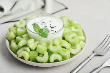 Chopped celery stalks with greek yogurt