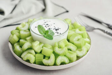 Chopped celery stalks with greek yogurt