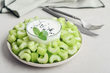 Chopped celery stalks with greek yogurt