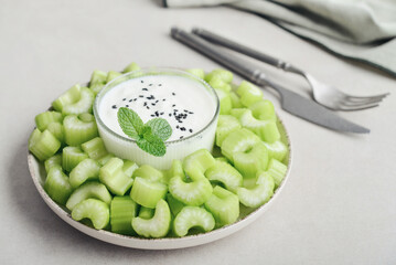 Chopped celery stalks with greek yogurt