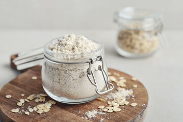 Oat flour in glass jar