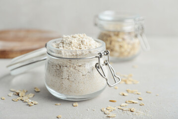 Oat flour in glass jar
