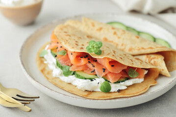 Oatmeal pancakes with slightly salted salmon