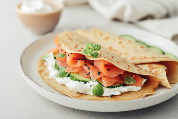 Oatmeal pancakes with slightly salted salmon