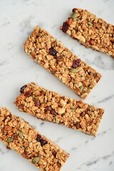 Gluten-free oat granola bars with nuts and berries.