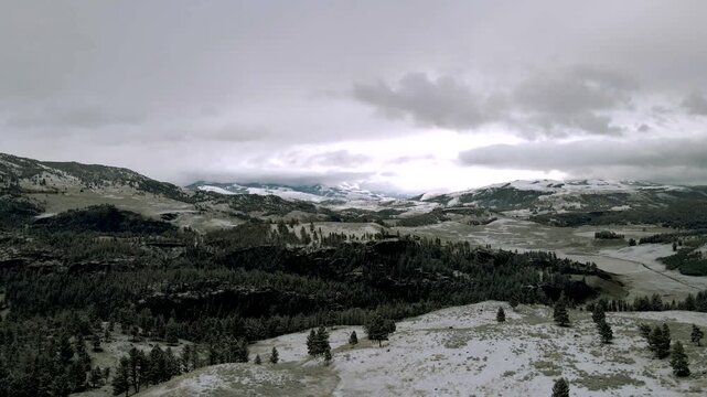 Aerial view of a landscape in Yellowstone Park in winter under the snow